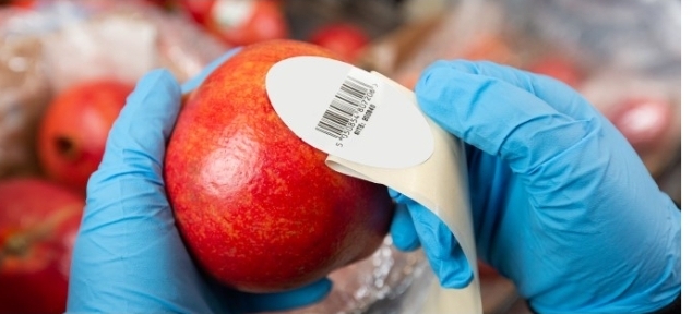 Relabeling services - applying barcode label to produce